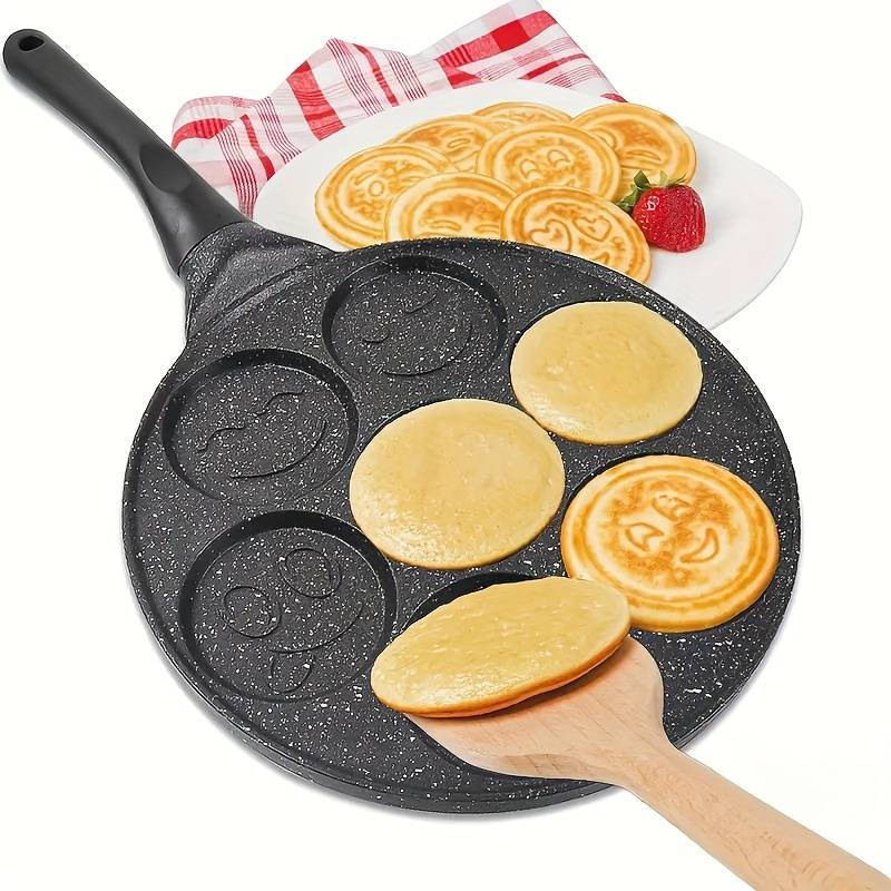 Tigaie pentru clatite, Zola®, 7 fete amuzante, aluminiu si otel inoxidabil, diametru tigaie 26 cm, diametru forma 6.5 cm Tigaie pentru clatite, Zola®, 7 fete amuzante, aluminiu si otel inoxidabil, diametru tigaie 26 cm, diametru forma 6.5 cm